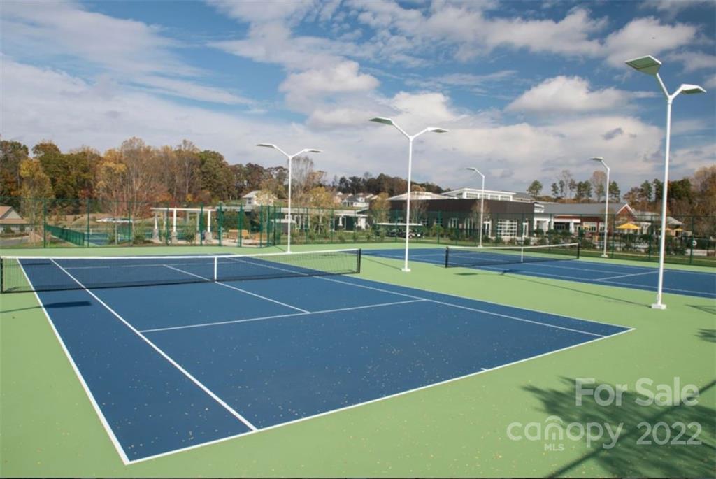 6136 Pier Drive, Unit 1139 Denver, NC 28037 - Photo 12 of 12 a view of an outdoor space and tennis court