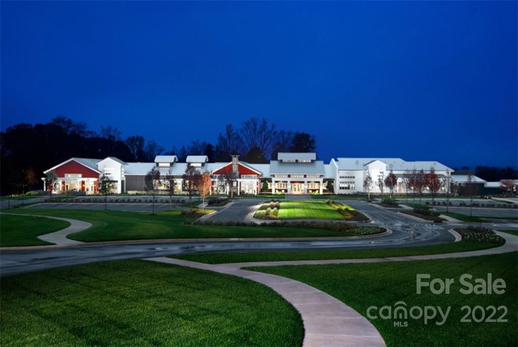 6136 Pier Drive, Unit 1139 Denver, NC 28037 - Photo 7 of 12 a view of yard with outdoor seating and green space