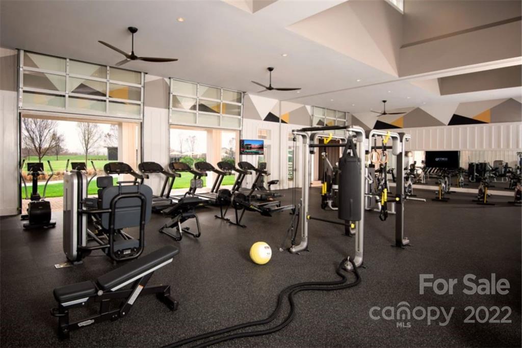 6136 Pier Drive, Unit 1139 Denver, NC 28037 - Photo 10 of 12 a view of a room with gym equipment