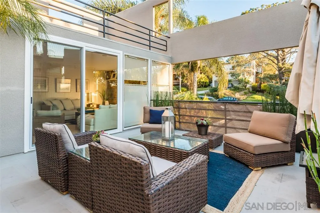 2134 Cordero Road Del Mar, CA 92014 - Photo 16 of 25 a living room with furniture and a large window