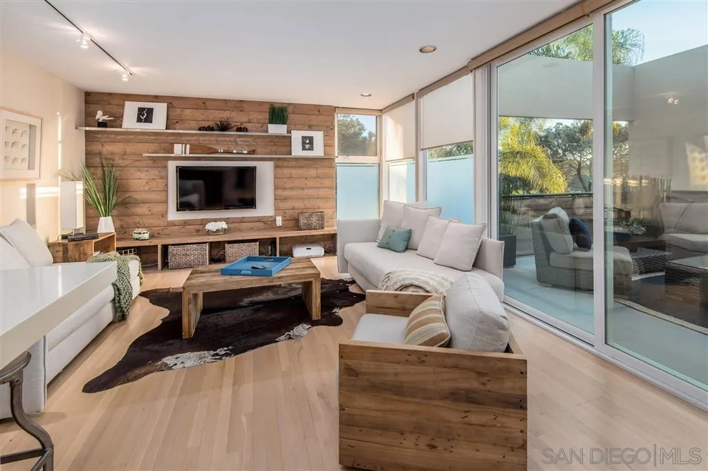 2134 Cordero Road Del Mar, CA 92014 - Photo 5 of 25 a living room with furniture and a flat screen tv