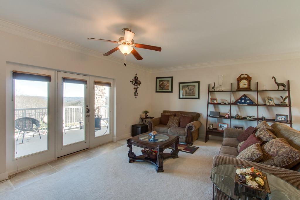 7100 Dale Ridge Road, Unit C2 Lancaster, TN 38569 - Photo 1 of 24 a living room with furniture and a large window