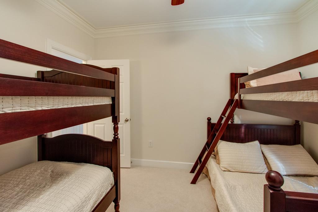 7100 Dale Ridge Road, Unit C2 Lancaster, TN 38569 - Photo 18 of 24 a bedroom with a bed and a window