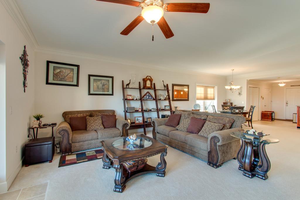 7100 Dale Ridge Road, Unit C2 Lancaster, TN 38569 - Photo 3 of 24 a living room with furniture and a chandelier