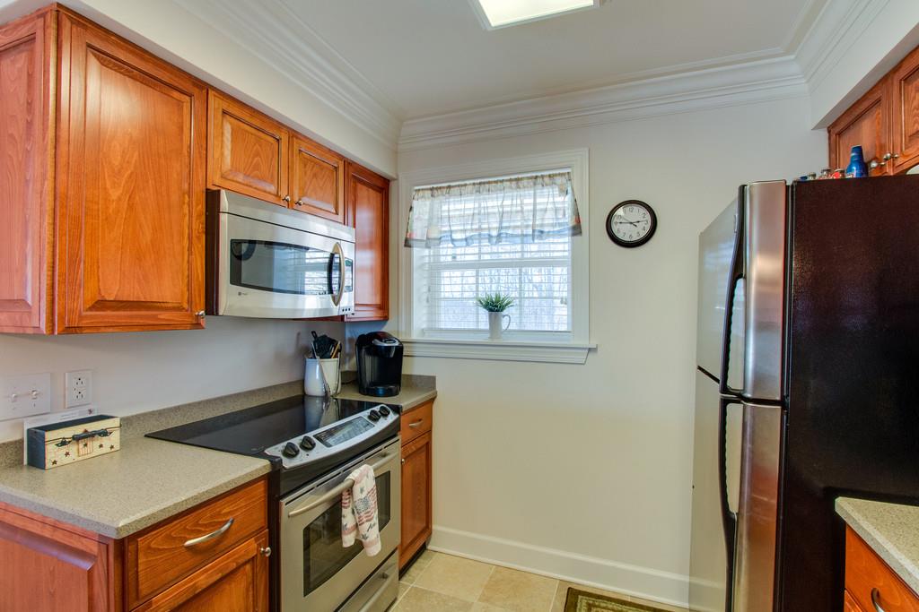 7100 Dale Ridge Road, Unit C2 Lancaster, TN 38569 - Photo 10 of 24 a kitchen with a refrigerator stove and sink