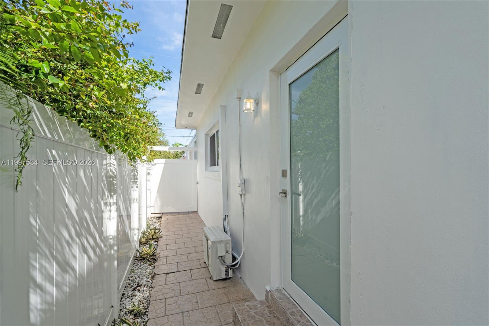 201 Southwest 51st Court, Unit 3 Miami, FL 33134 - Photo 1 of 6 a view of a house with a backyard