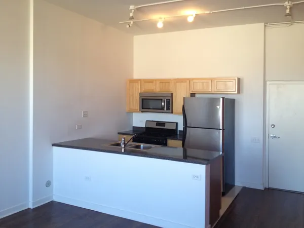 a utility room with washer and dryer