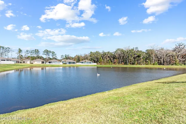a view of a lake with a city