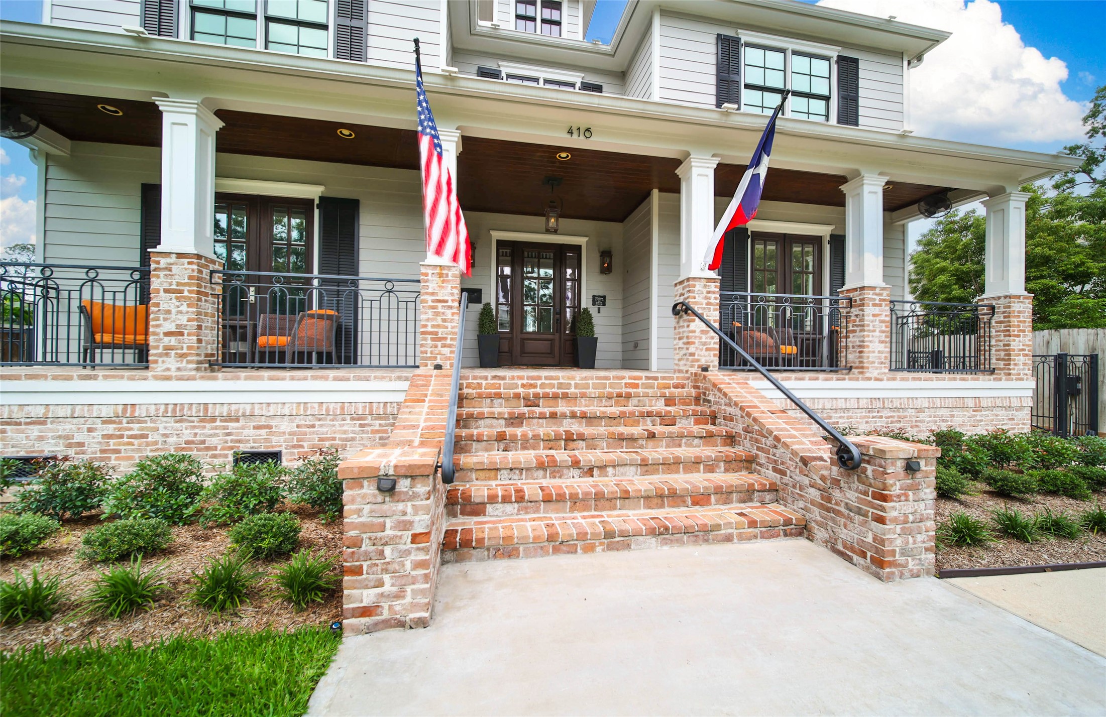 416 West 33rd Street Houston, TX 77018 - Photo 3 of 47 Expansive front porch designed for slow mornings with coffee and peaceful evenings unwinding while overlooking the lush green lawn. Thoughtful craftsmanship shines through the detailed masonry work, creating timeless curb appeal and the perfect setting to connect with neighbors in the close-knit Garden Oaks community.