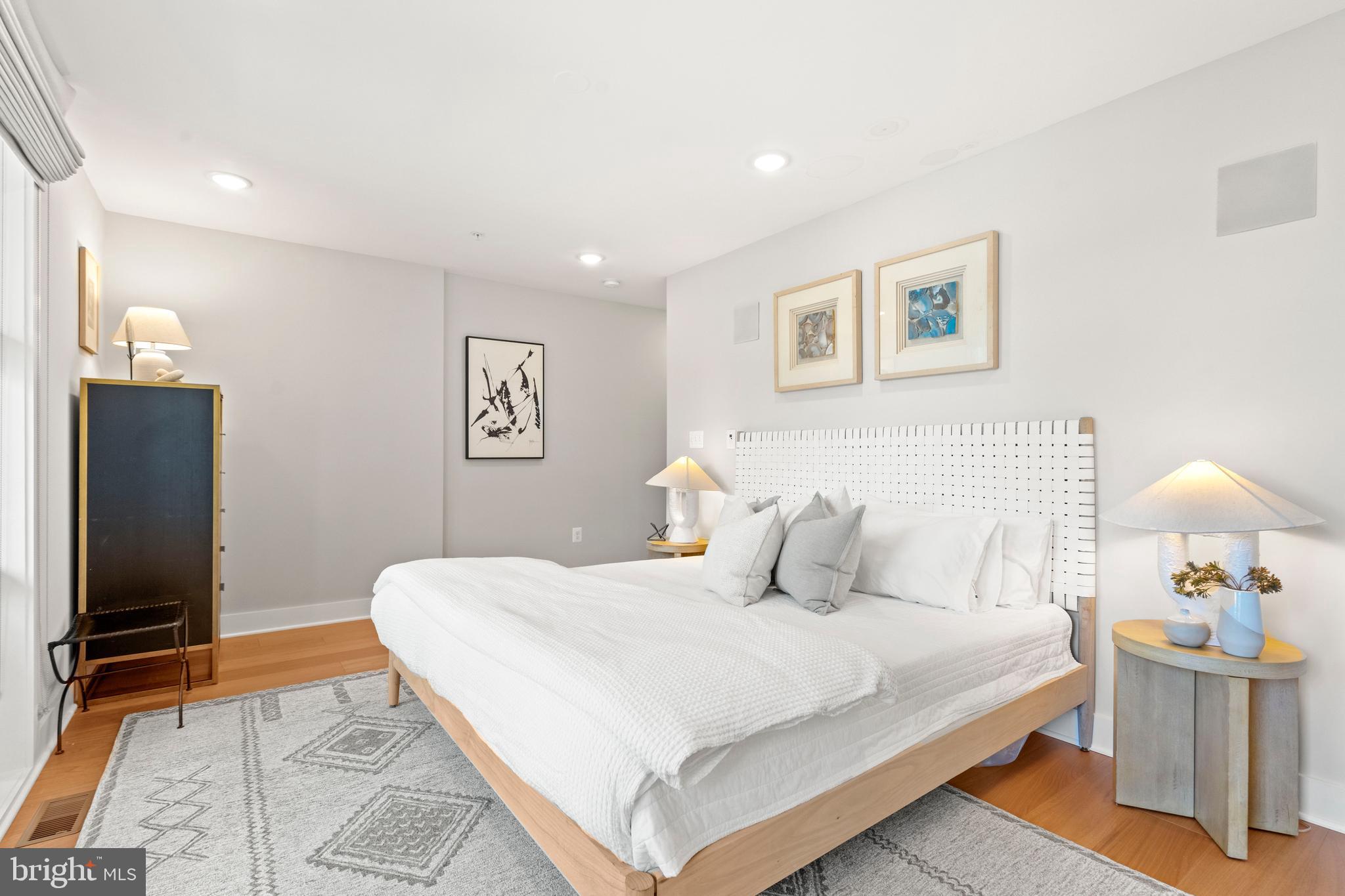 910 9th Street Northeast, Unit 1 Washington, DC 20002 - Photo 32 of 66 a bedroom with a bed and a mirror