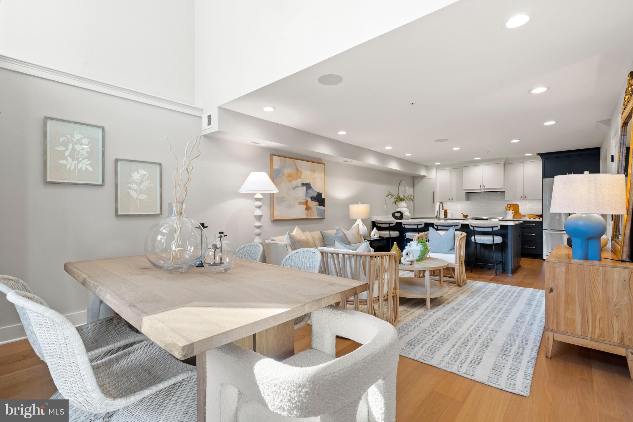 910 9th Street Northeast, Unit 1 Washington, DC 20002 - Photo 4 of 66 a view of a dining room with furniture and wooden floor