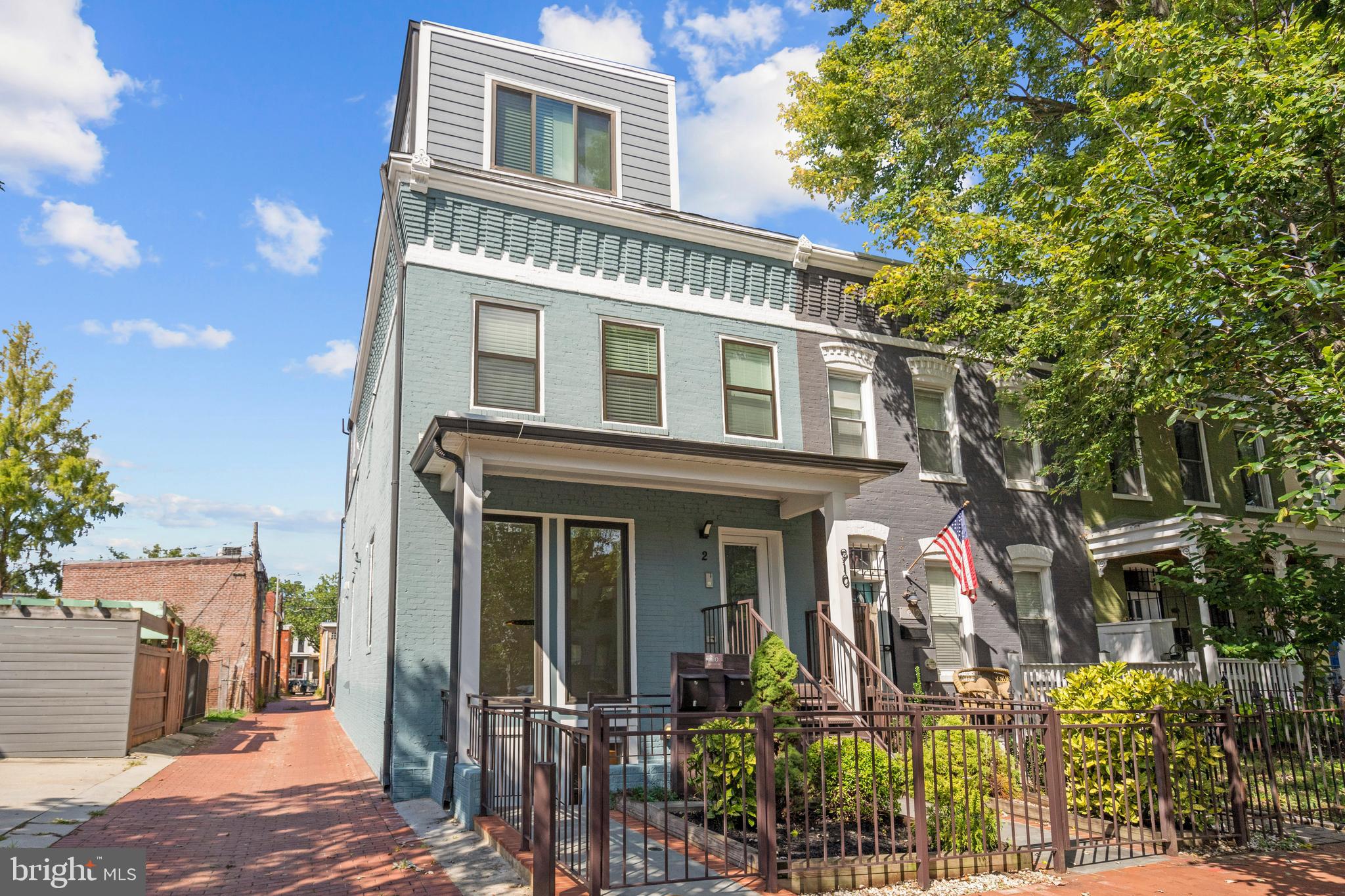 910 9th Street Northeast, Unit 1 Washington, DC 20002 - Photo 63 of 66 a front view of a house with a porch