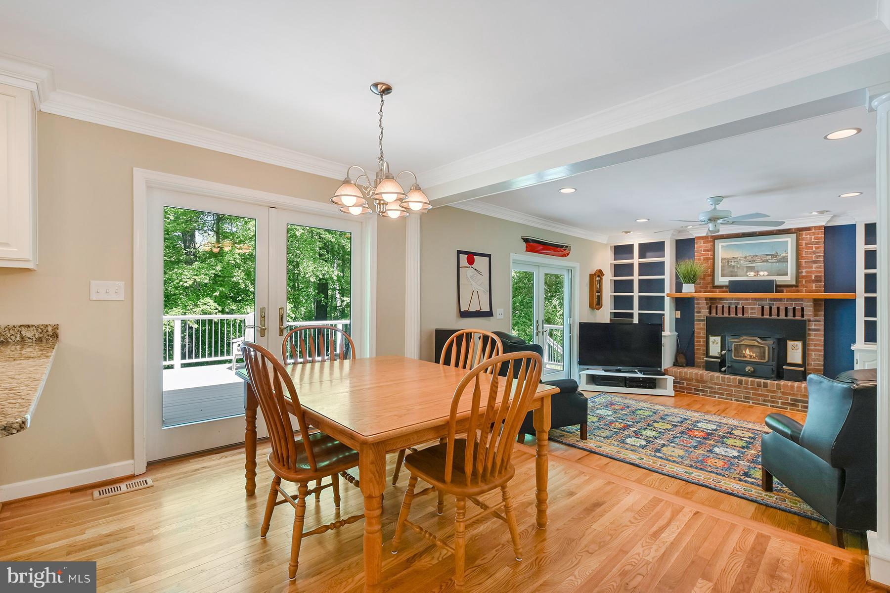 3226 Cragun Road Edgewater, MD 21037 - Photo 19 of 57 InformaI dining space overlooks deck