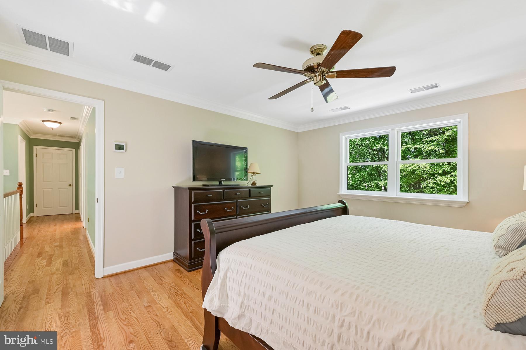 3226 Cragun Road Edgewater, MD 21037 - Photo 28 of 57 Primary bedroom has beautiful hardwood floors