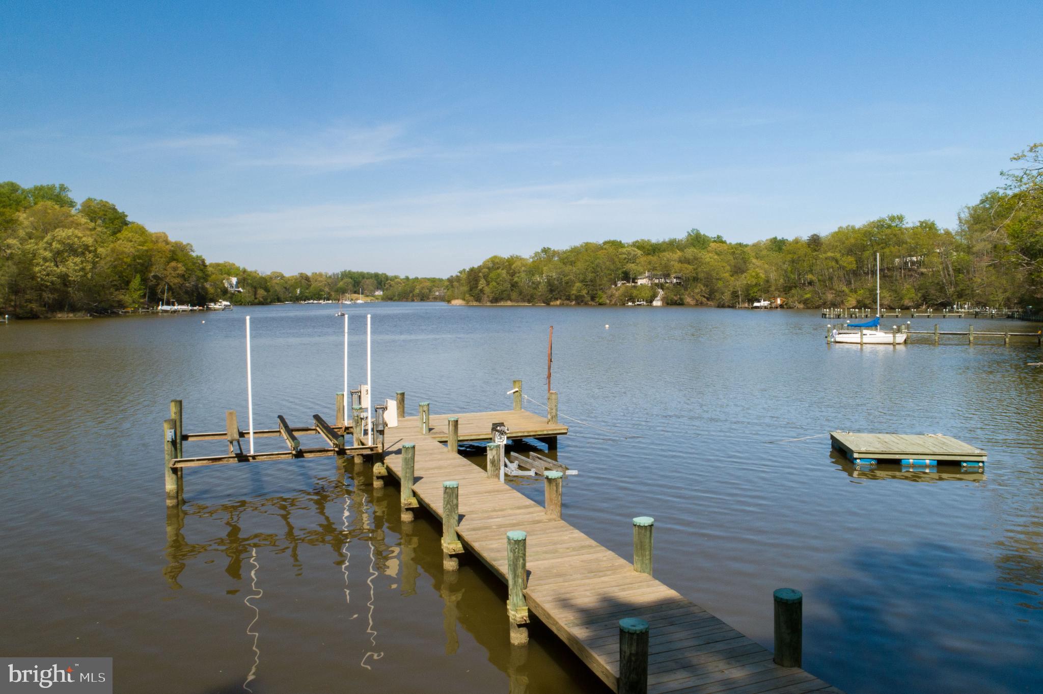 3226 Cragun Road Edgewater, MD 21037 - Photo 40 of 57 View of private pier with floating dock