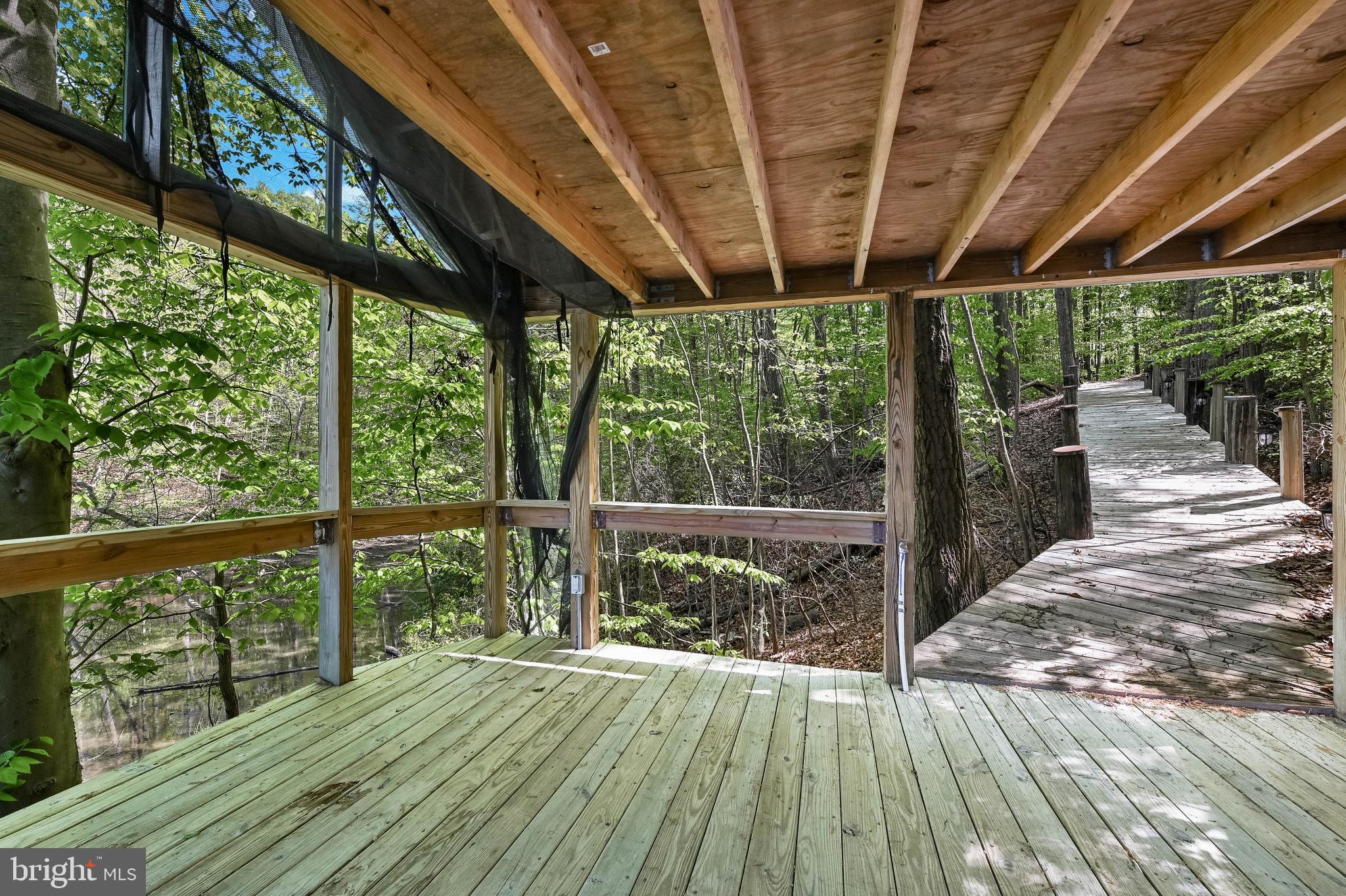 3226 Cragun Road Edgewater, MD 21037 - Photo 47 of 57 Walk-way to pier includes this covered porch