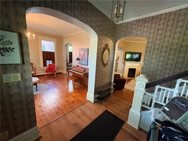 a living room with furniture or couch and a flat screen tv
