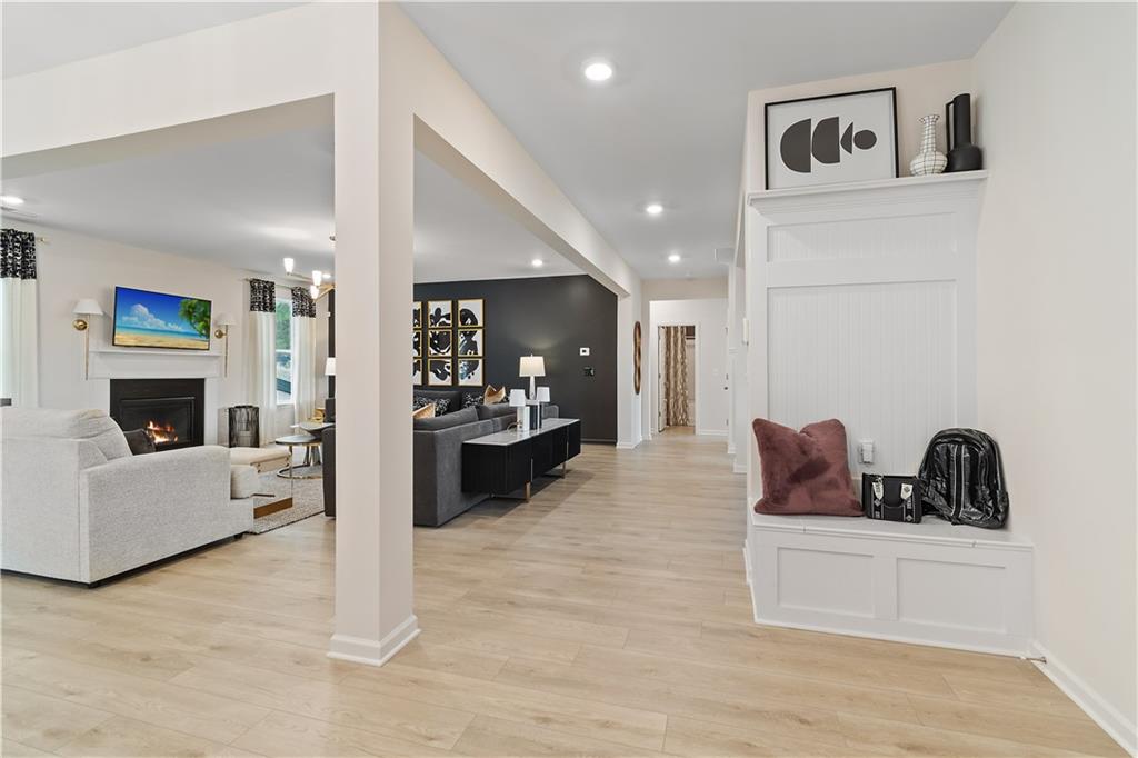 229 Ruthe Cove Locust Grove, GA 30248 - Photo 26 of 56 a living room with furniture and a fireplace