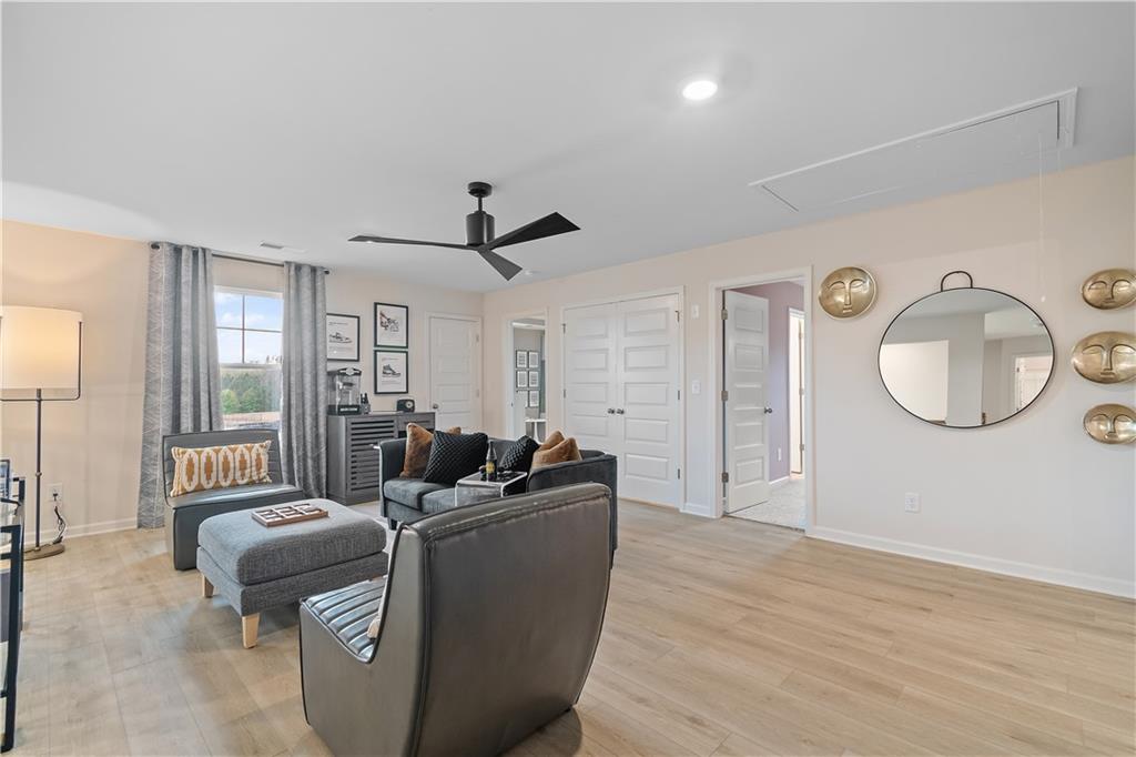 229 Ruthe Cove Locust Grove, GA 30248 - Photo 30 of 56 a living room with furniture