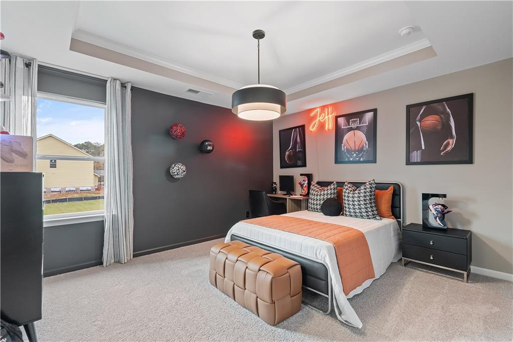 229 Ruthe Cove Locust Grove, GA 30248 - Photo 36 of 56 a bedroom with a bed and a window