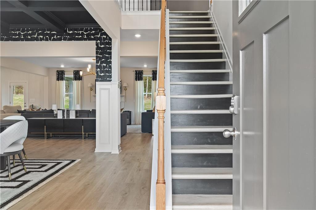 229 Ruthe Cove Locust Grove, GA 30248 - Photo 4 of 56 a view of a living room and entryway