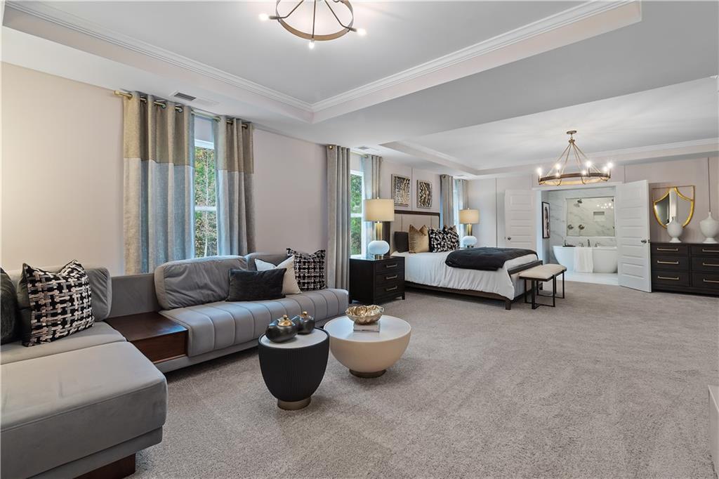 229 Ruthe Cove Locust Grove, GA 30248 - Photo 41 of 56 a living room with furniture and a large window
