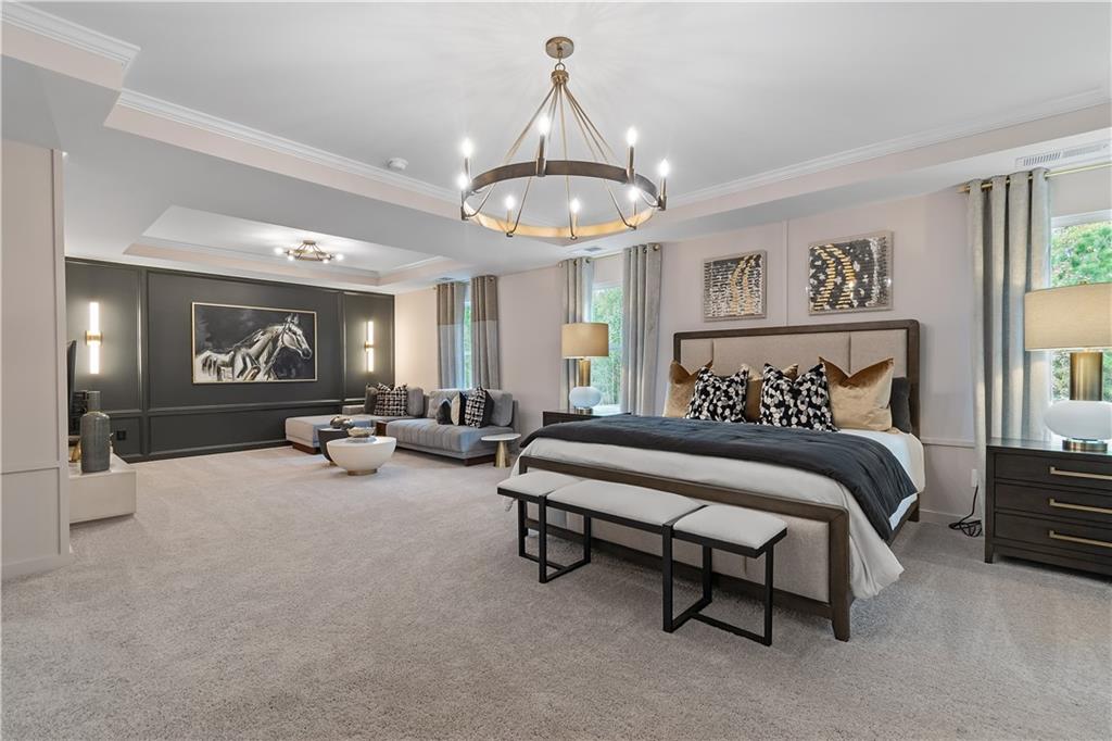 229 Ruthe Cove Locust Grove, GA 30248 - Photo 44 of 56 a spacious bedroom with a bed furniture and windows