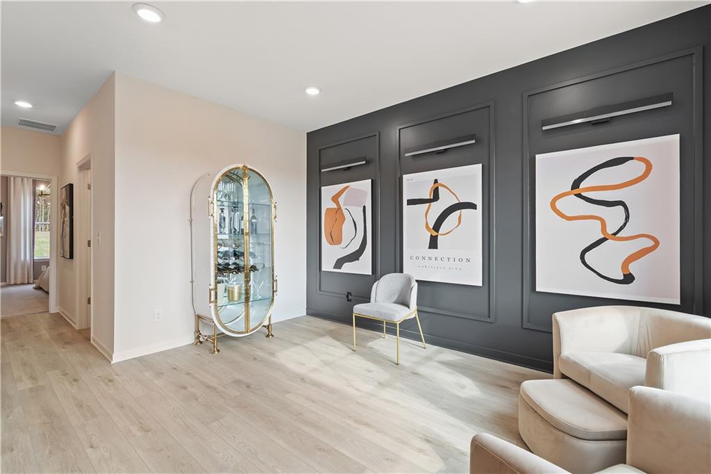 229 Ruthe Cove Locust Grove, GA 30248 - Photo 5 of 56 a living room with furniture and a window