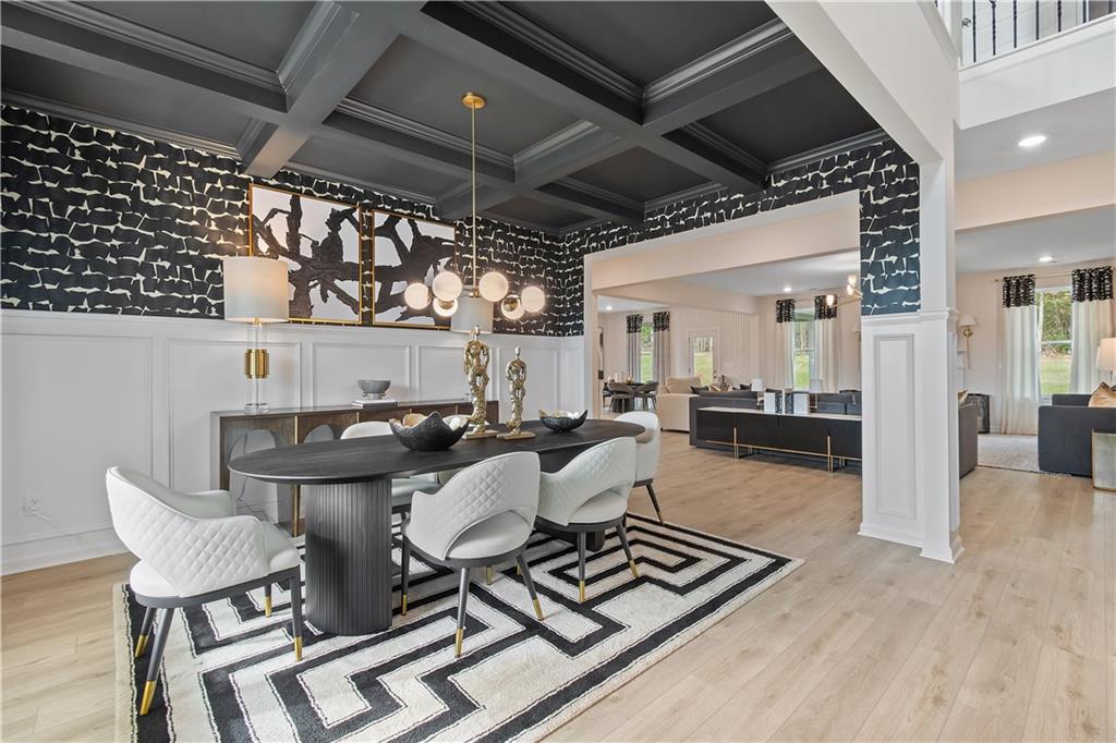 229 Ruthe Cove Locust Grove, GA 30248 - Photo 7 of 56 a view of a dining room with furniture