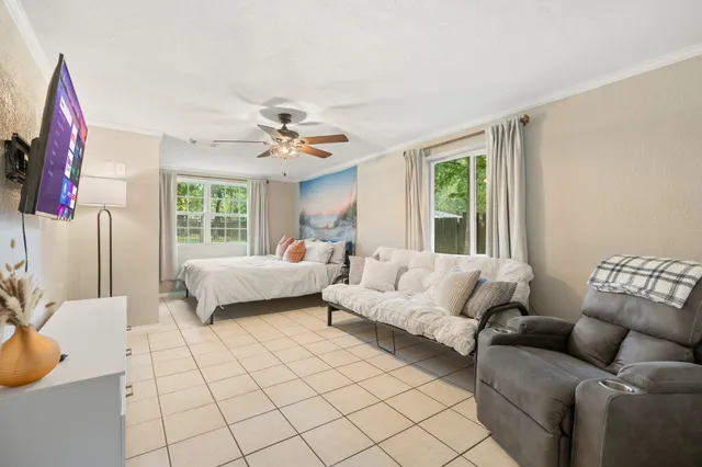 a bedroom with a closet and a mirror