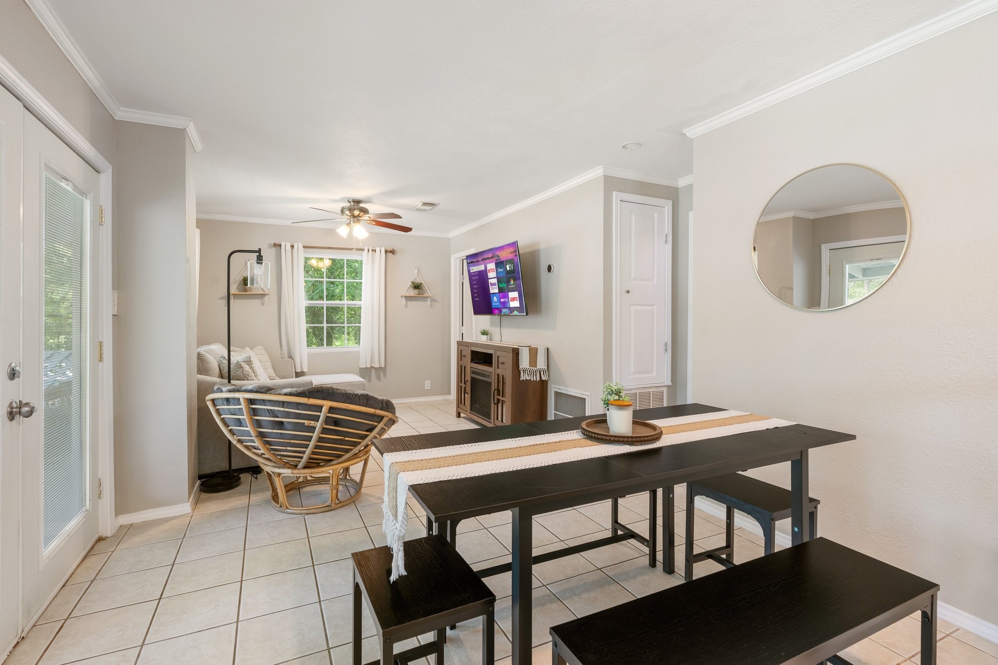 14758 Kirbee Drive Conroe, TX 77302 - Photo 20 of 35 Experience modern comfort in this inviting second-floor space, featuring a seamless blend of dining and living areas perfect for relaxation and entertaining.