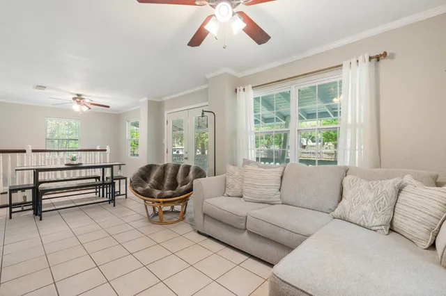 a bathroom with a double vanity sink toilet and shower