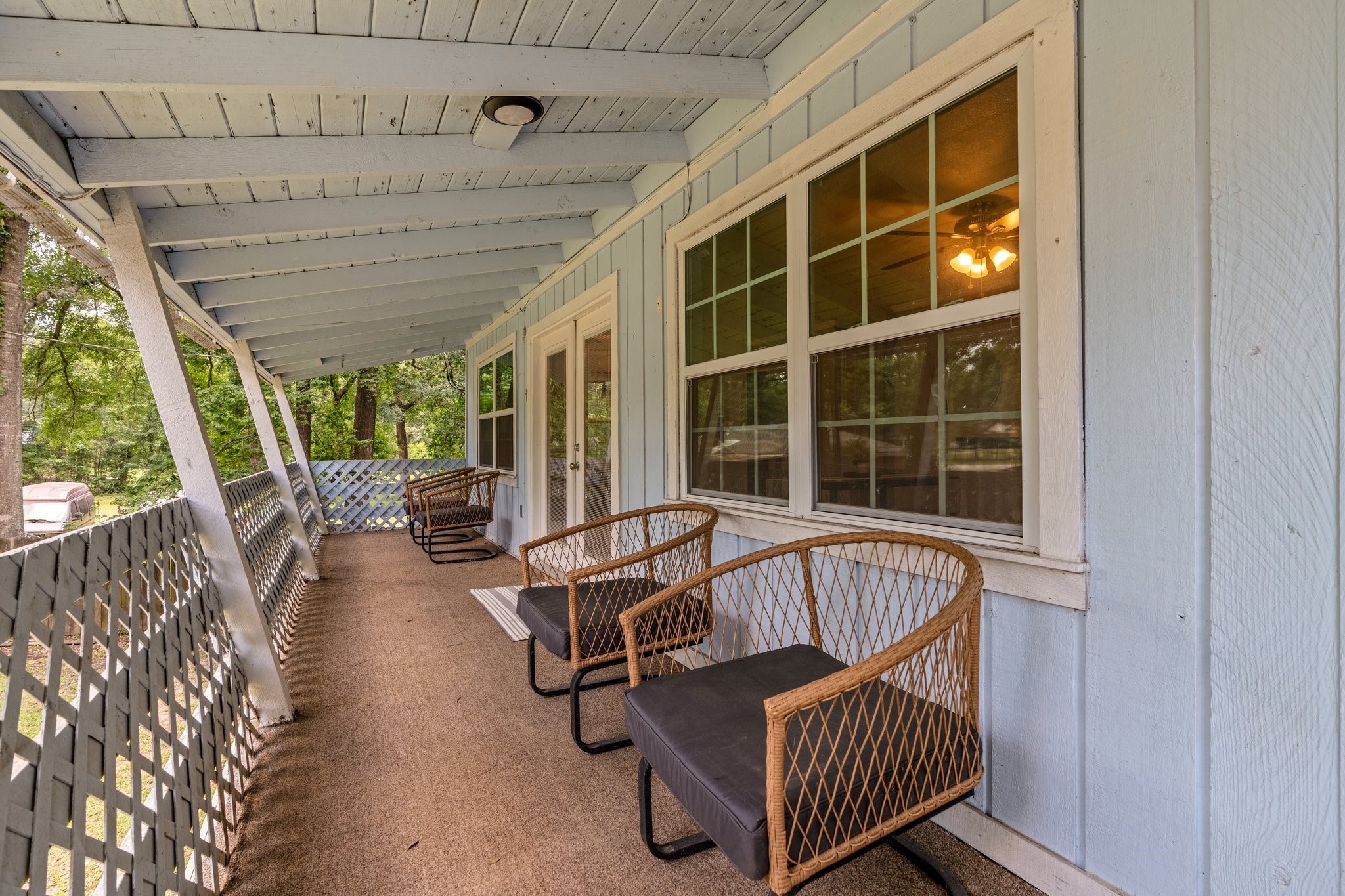 14758 Kirbee Drive Conroe, TX 77302 - Photo 33 of 35 Covered patio upstairs off of Living Room.