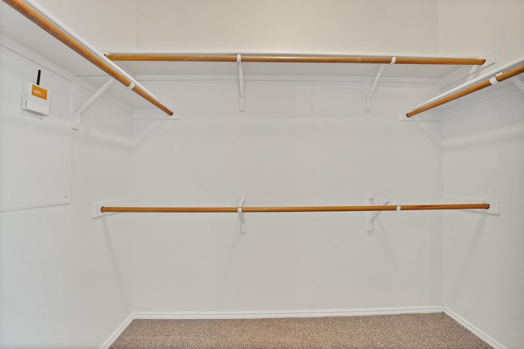 3813 Cane River Road Fort Worth, TX 76244 - Photo 23 of 28 a close up view of racks on the wall