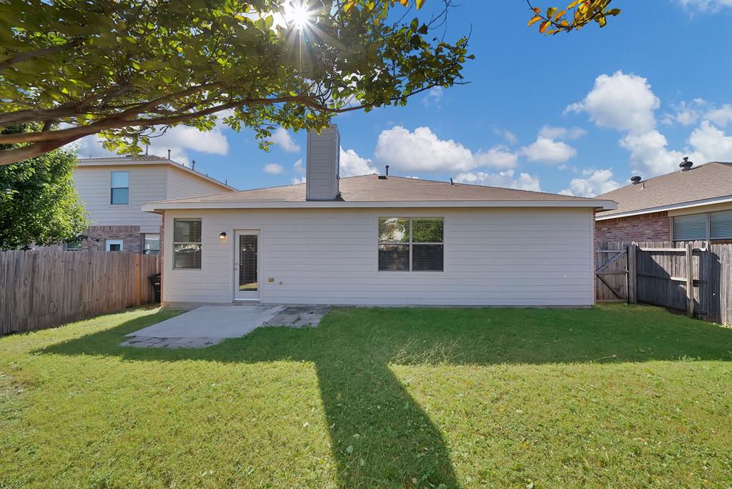 3813 Cane River Road Fort Worth, TX 76244 - Photo 26 of 28 a front view of a house with garden