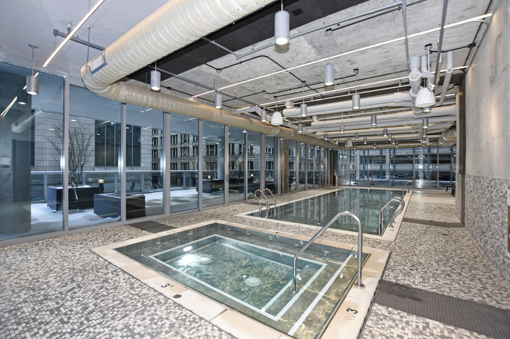 60 East Randolph Street, Unit 1303 Chicago, IL 60601 - Photo 22 of 38 a view of swimming pool with a patio