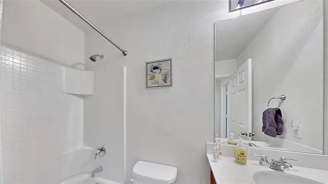 a bed room with furniture and a window