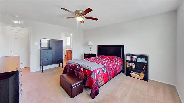 a view of a dining room with furniture wooden floor and a chandelier