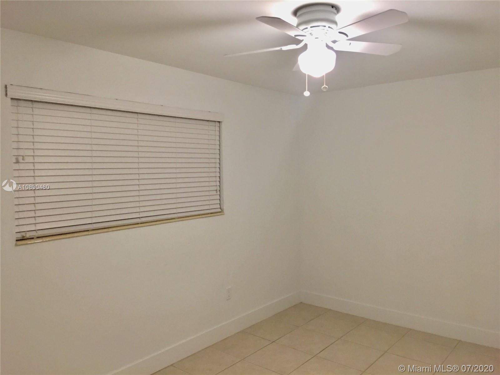 310 Southwest 34th Avenue, Unit 310 Miami, FL 33135 - Photo 11 of 18 a view of a small space with a fan