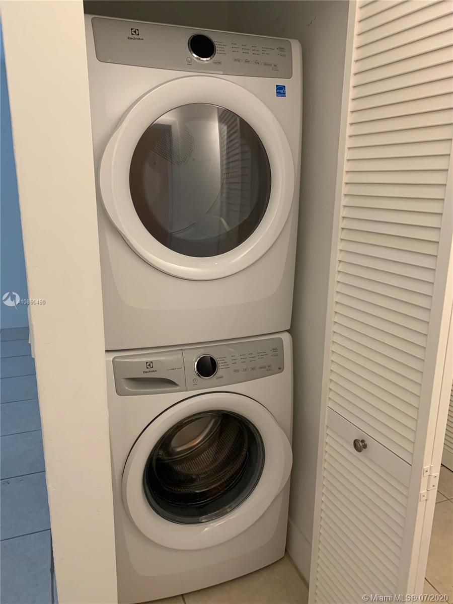 310 Southwest 34th Avenue, Unit 310 Miami, FL 33135 - Photo 9 of 18 a utility room with dryer and washer