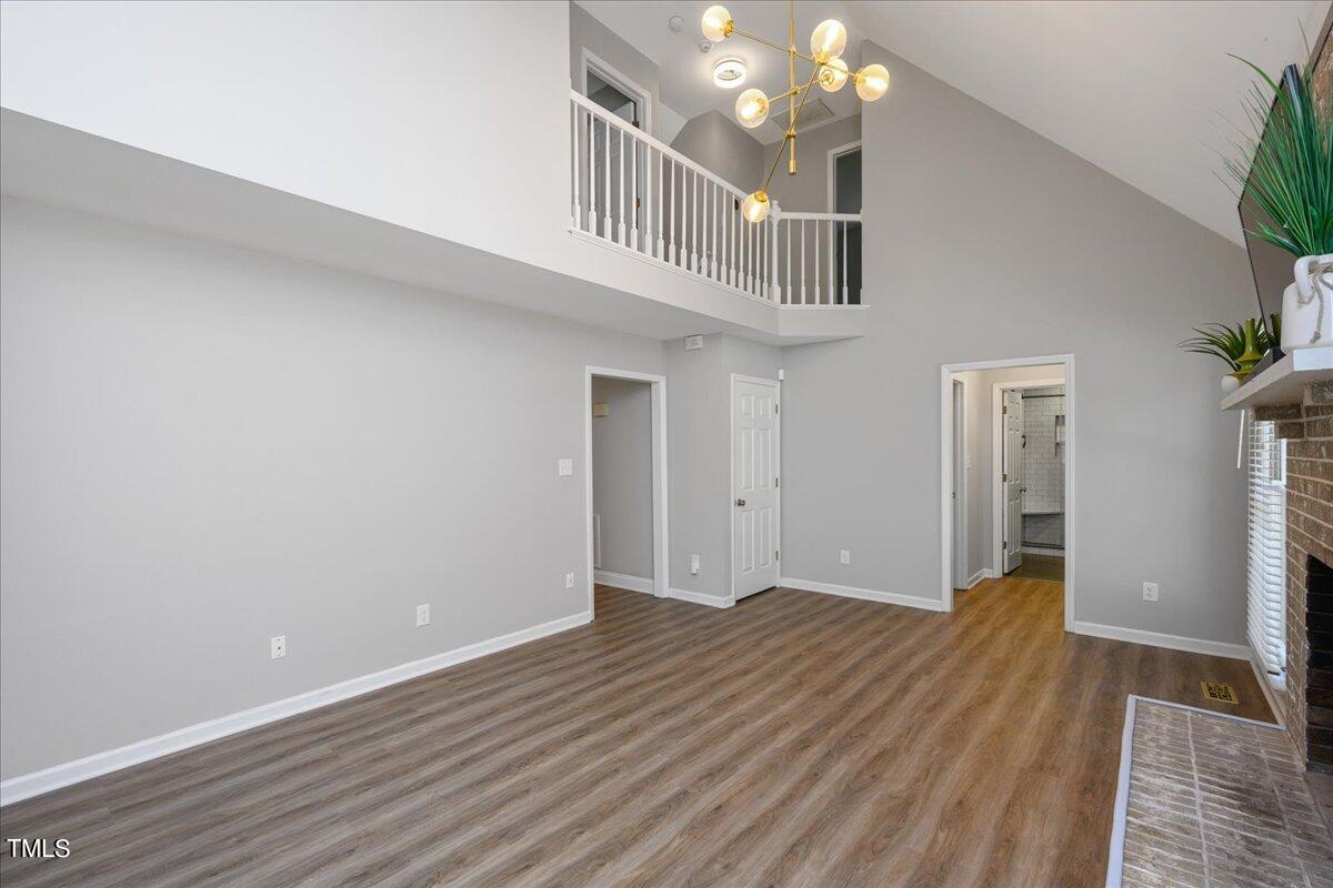 2005 Broadingham Court Raleigh, NC 27615 - Photo 13 of 27 a view of a livingroom with wooden floor