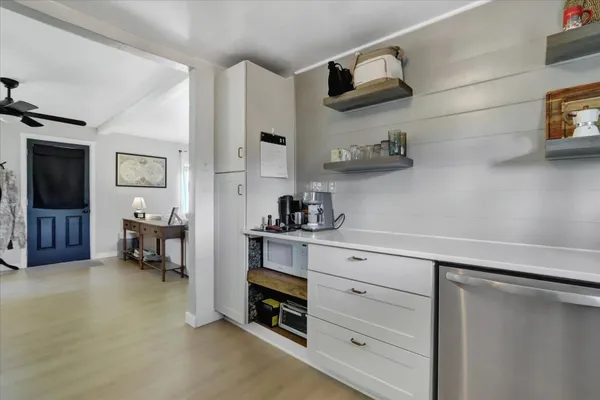 a view of a bathroom from the hallway