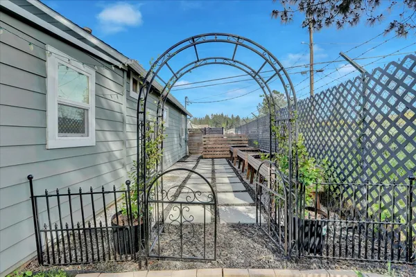 a view of a balcony with chairs and a table