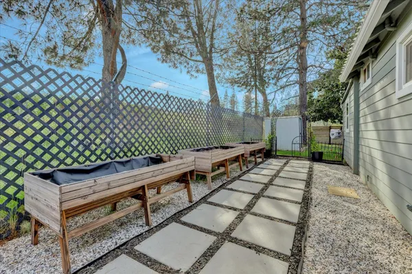 a backyard of a house with lots of green space