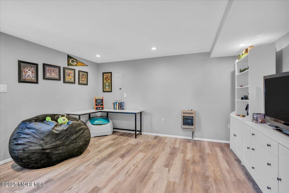 6 Reno Court Barnegat, NJ 08005 - Photo 12 of 35 a living room with furniture and a flat screen tv