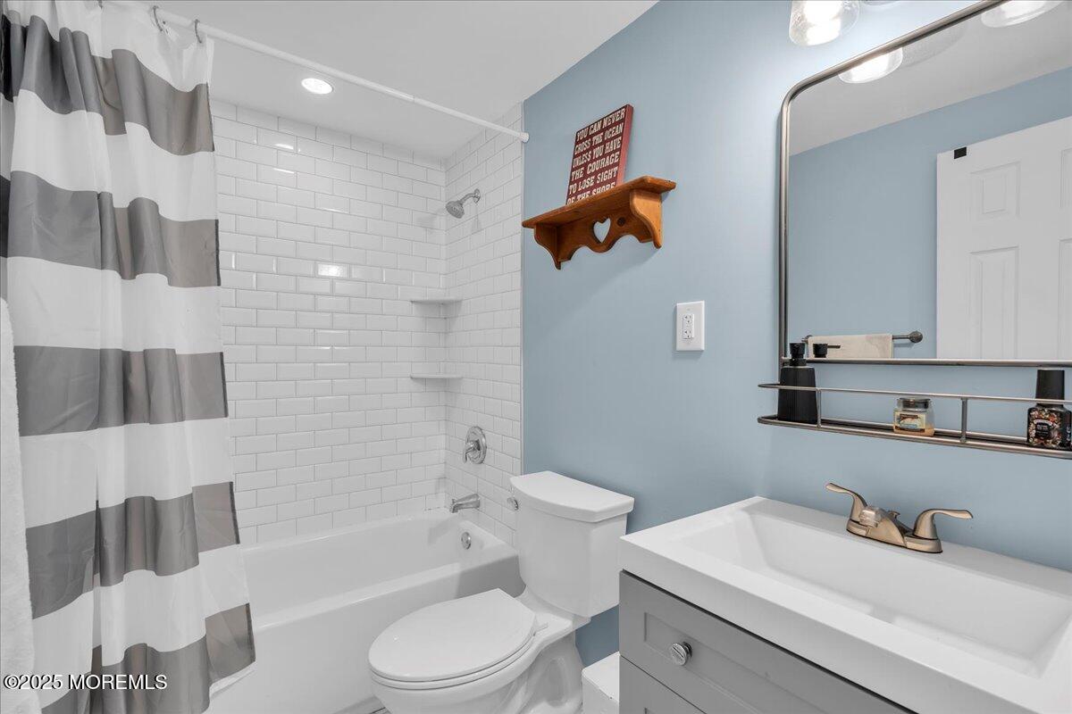 6 Reno Court Barnegat, NJ 08005 - Photo 20 of 35 a bathroom with a sink toilet and shower