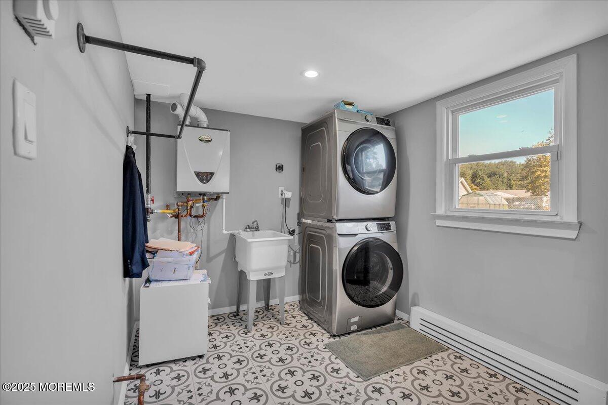 6 Reno Court Barnegat, NJ 08005 - Photo 21 of 35 a view of a storage & utility room with a washer and dryer