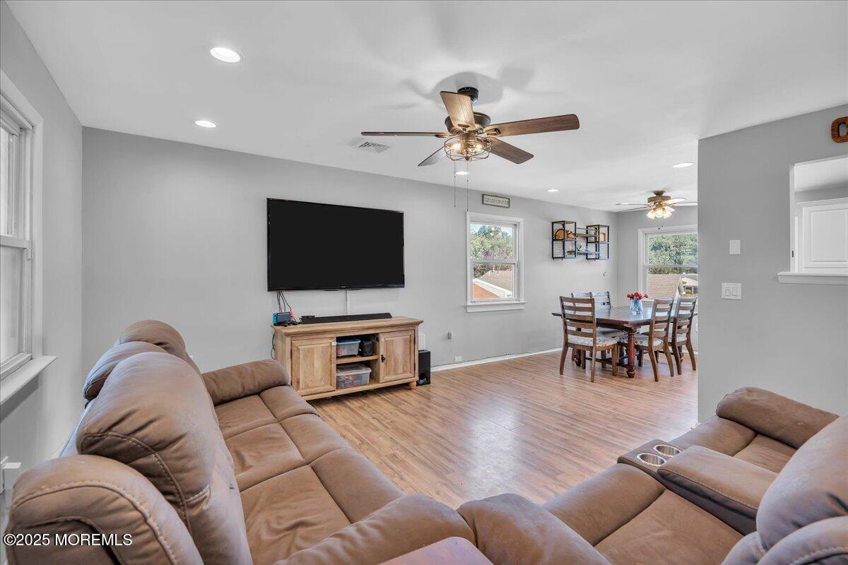 6 Reno Court Barnegat, NJ 08005 - Photo 6 of 35 a living room with furniture and a flat screen tv
