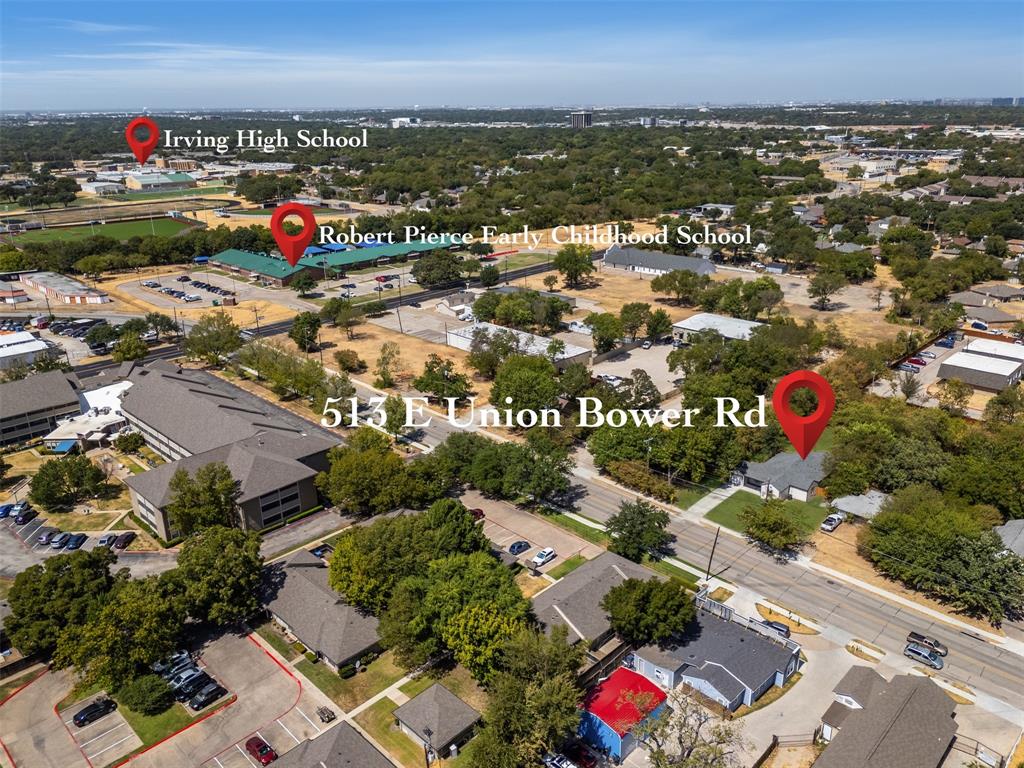 513 East Union Bower Road Irving, TX 75061 - Photo 33 of 34 Aerial perspective of the property at 513 E Union Bower Rd, featuring surrounding residential and institutional buildings