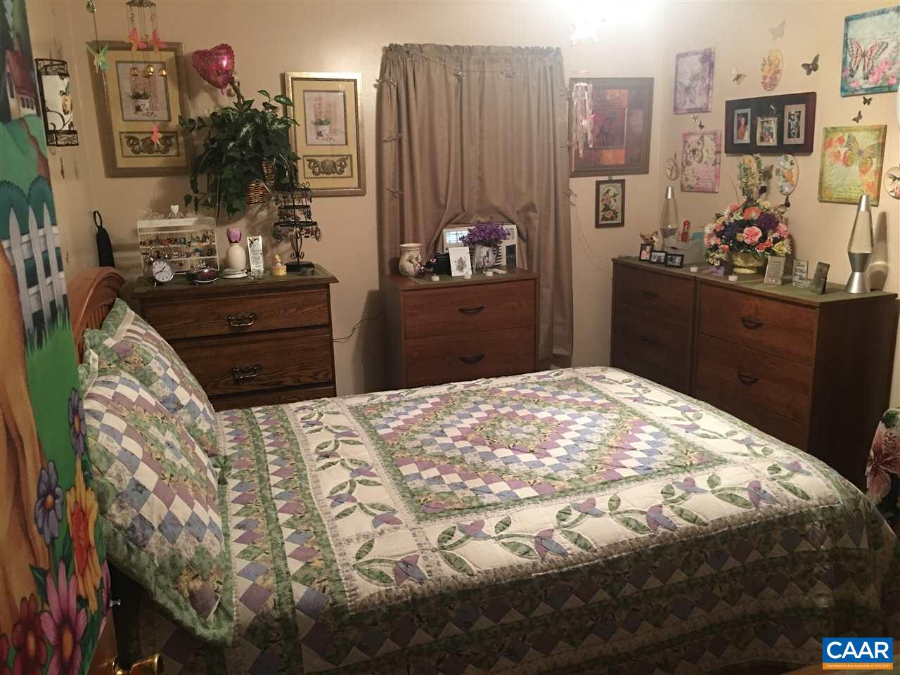 1715 Oneals Road Madison, VA 22727 - Photo 4 of 11 a bed sitting in a bedroom and closet